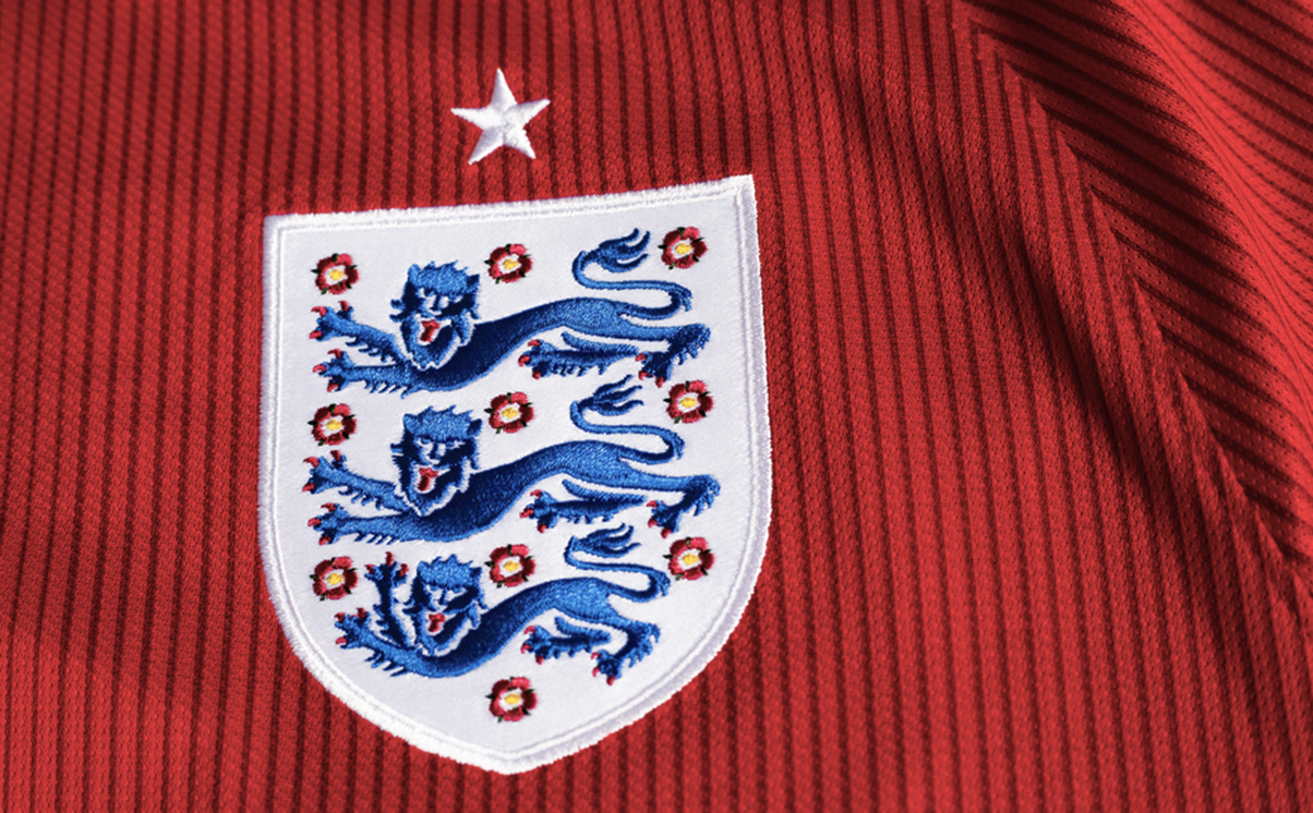 England Football badge on red shirt