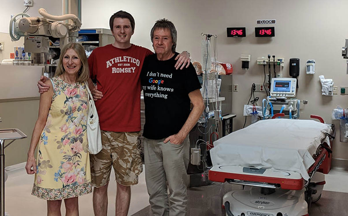Stephen with his parents in hospital